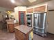 Well-equipped kitchen featuring stainless steel appliances and a convenient center island at 15708 E Chicory Dr, Fountain Hills, AZ 85268