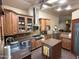 Spacious kitchen with stainless steel appliances, a large island, and ample cabinet space at 15708 E Chicory Dr, Fountain Hills, AZ 85268