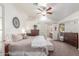 Spacious main bedroom with ensuite bathroom and ceiling fan at 15708 E Chicory Dr, Fountain Hills, AZ 85268