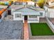 Bird's-eye view of a renovated home with solar panels at 1614 W Lynwood St, Phoenix, AZ 85007