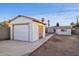 Detached garage with backyard view and additional storage at 1614 W Lynwood St, Phoenix, AZ 85007