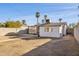 Large backyard with detached shed and house view at 1614 W Lynwood St, Phoenix, AZ 85007