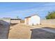 Large backyard with detached shed and block wall at 1614 W Lynwood St, Phoenix, AZ 85007