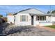Well-maintained home with a brick driveway and walkway at 1614 W Lynwood St, Phoenix, AZ 85007