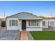 Recently updated home with artificial turf and new landscaping at 1614 W Lynwood St, Phoenix, AZ 85007