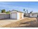 Detached single-car garage with driveway access at 1614 W Lynwood St, Phoenix, AZ 85007