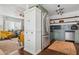 Modern kitchen with stainless steel appliances and teal cabinets at 1614 W Lynwood St, Phoenix, AZ 85007