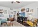 Living room with hardwood floors, eclectic decor, and comfortable seating at 1614 W Lynwood St, Phoenix, AZ 85007