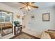 Bedroom with mirrored closet and futon, offering versatile space at 1616 N Alta Mesa Dr # 76, Mesa, AZ 85205