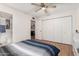 Bright bedroom with wood flooring and access to bathroom at 1701 W Tuckey Ln # 218, Phoenix, AZ 85015