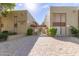 La Fuente Condominiums exterior showing building entrance and paved pathway at 1701 W Tuckey Ln # 218, Phoenix, AZ 85015