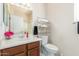 Clean bathroom with toilet, sink, and shower at 17311 N Havasupai Dr, Surprise, AZ 85374