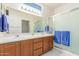 Bathroom boasts double sinks and a shower at 17311 N Havasupai Dr, Surprise, AZ 85374