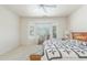 Spacious bedroom with bay window and ceiling fan at 17311 N Havasupai Dr, Surprise, AZ 85374