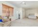 Bedroom with sliding door and ceiling fan at 17311 N Havasupai Dr, Surprise, AZ 85374