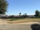 View of homes and golf course in a desert setting at 17311 N Havasupai Dr, Surprise, AZ 85374