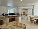 Open concept kitchen with granite island and Gathering room views at 17311 N Havasupai Dr, Surprise, AZ 85374