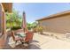 Private patio with table and chairs at 17311 N Havasupai Dr, Surprise, AZ 85374