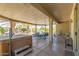 Covered patio with hot tub and seating at 17311 N Havasupai Dr, Surprise, AZ 85374