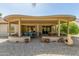 Covered patio with hot tub and seating area at 17311 N Havasupai Dr, Surprise, AZ 85374