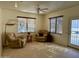 Bright sitting area with two recliners and door access at 17311 N Havasupai Dr, Surprise, AZ 85374