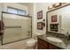 Full bathroom with tub/shower combo and granite vanity at 17901 W Tierra Del Sol Dr, Surprise, AZ 85387