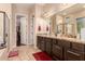 Bathroom features double vanity and granite countertops at 1819 W Magdalena Ln, Phoenix, AZ 85041