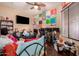 Multi-purpose bedroom with a desk and comfy seating at 1819 W Magdalena Ln, Phoenix, AZ 85041