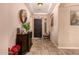 Bright and spacious entryway with tile flooring and decorative accents at 1819 W Magdalena Ln, Phoenix, AZ 85041
