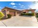 Beautiful two-story home with a three-car garage and landscaped front yard at 1819 W Magdalena Ln, Phoenix, AZ 85041