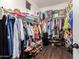 Large walk-in closet with ample shelving and hanging space at 1819 W Magdalena Ln, Phoenix, AZ 85041