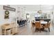 Bright dining area with modern chandelier and seating for six at 19759 W Devonshire Ave, Litchfield Park, AZ 85340