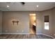 Bedroom with wood-look floors and ensuite bathroom access at 20226 N 260Th Dr, Buckeye, AZ 85396