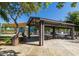 Park gazebo with picnic tables and BBQ grills at 20226 N 260Th Dr, Buckeye, AZ 85396