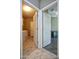 Hallway view with doors to laundry and another room at 20226 N 260Th Dr, Buckeye, AZ 85396