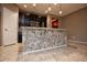 Modern kitchen with island and dark wood cabinets at 20226 N 260Th Dr, Buckeye, AZ 85396