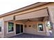 Covered patio with ceiling fan and shade screens at 20226 N 260Th Dr, Buckeye, AZ 85396