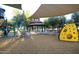 Playground with shade structures and play equipment at 20226 N 260Th Dr, Buckeye, AZ 85396