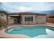 Stunning backyard with a luxurious pool, inviting patio, and landscaping, ideal for outdoor relaxation and entertainment at 20226 N 260Th Dr, Buckeye, AZ 85396
