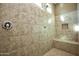 Walk-in shower with multiple shower heads and seat at 20226 N 260Th Dr, Buckeye, AZ 85396