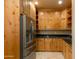 Kitchen with ample wood cabinetry, granite counters and stainless steel appliances at 25555 N Wrangler Rd, Scottsdale, AZ 85255