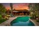 Inviting pool with flagstone decking at 25555 N Wrangler Rd, Scottsdale, AZ 85255