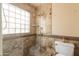 Bathroom with shower and glass enclosure at 2562 E Vermont Ave, Phoenix, AZ 85016