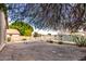 Backyard with lake view and lush landscaping at 2625 N 110Th Dr, Avondale, AZ 85392