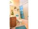 Cozy bathroom with a bathtub, shower, and decorative accents including framed artwork at 2625 N 110Th Dr, Avondale, AZ 85392