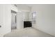 Small bedroom with a window and a flat screen TV at 2625 N 110Th Dr, Avondale, AZ 85392