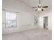 Bright and airy bedroom with ensuite bathroom access at 2625 N 110Th Dr, Avondale, AZ 85392