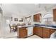 Open concept kitchen with views into dining area at 2625 N 110Th Dr, Avondale, AZ 85392