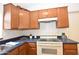 Efficient kitchen with light wood cabinetry and countertops, perfect for meal preparation at 2625 N 110Th Dr, Avondale, AZ 85392