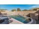 Enjoy this expansive backyard with a sparkling pool and patio at 29317 N 20Th Ave, Phoenix, AZ 85085